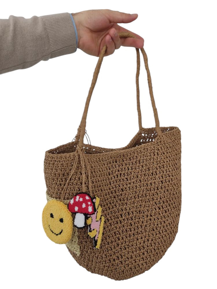 Raffia bag with icon charms