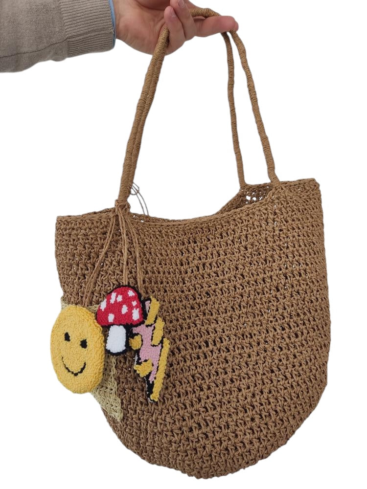 Raffia bag with icon charms
