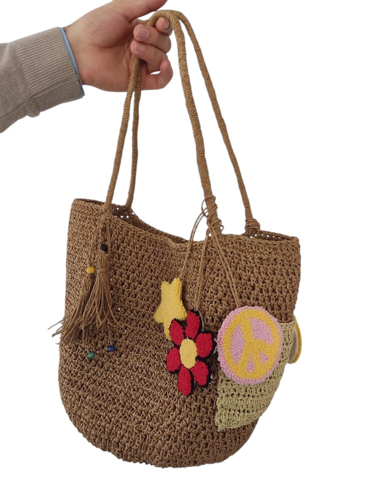 Raffia bag with icon charms